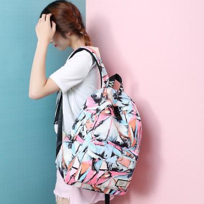 WINNER/优胜者印花双肩包女韩版休闲背包大学生书包男学院电脑包